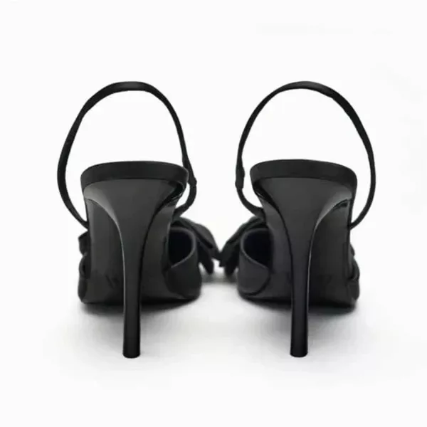 Black pointed-toe stiletto statement bow