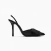 Black pointed-toe stiletto statement bow