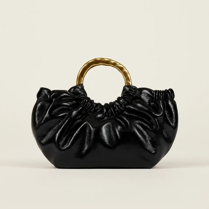 Vinyle Metal Handle Clutch in black