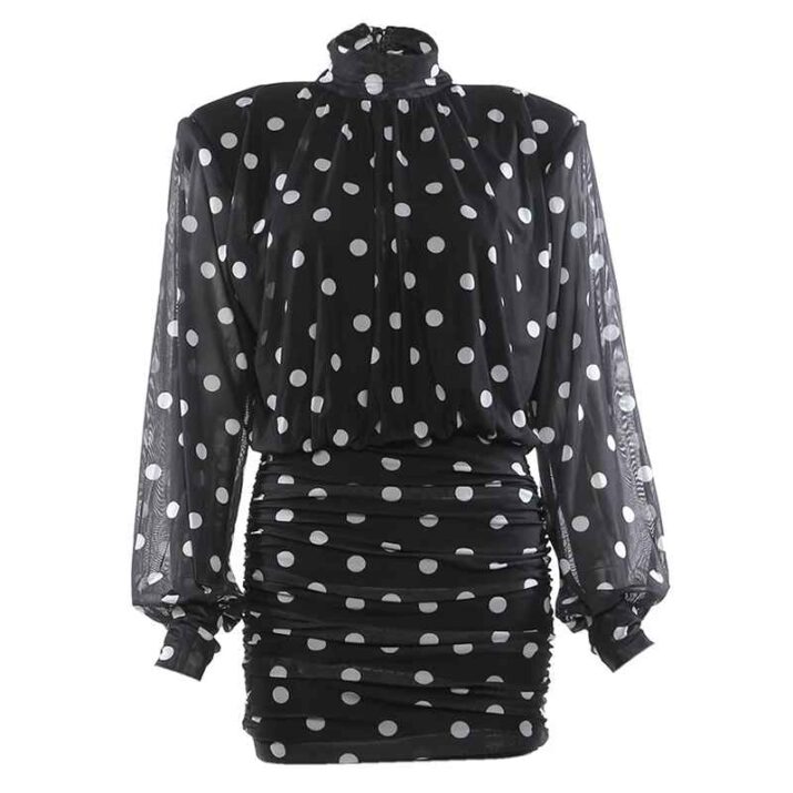 Stylish black dress with white polka dots and high neck